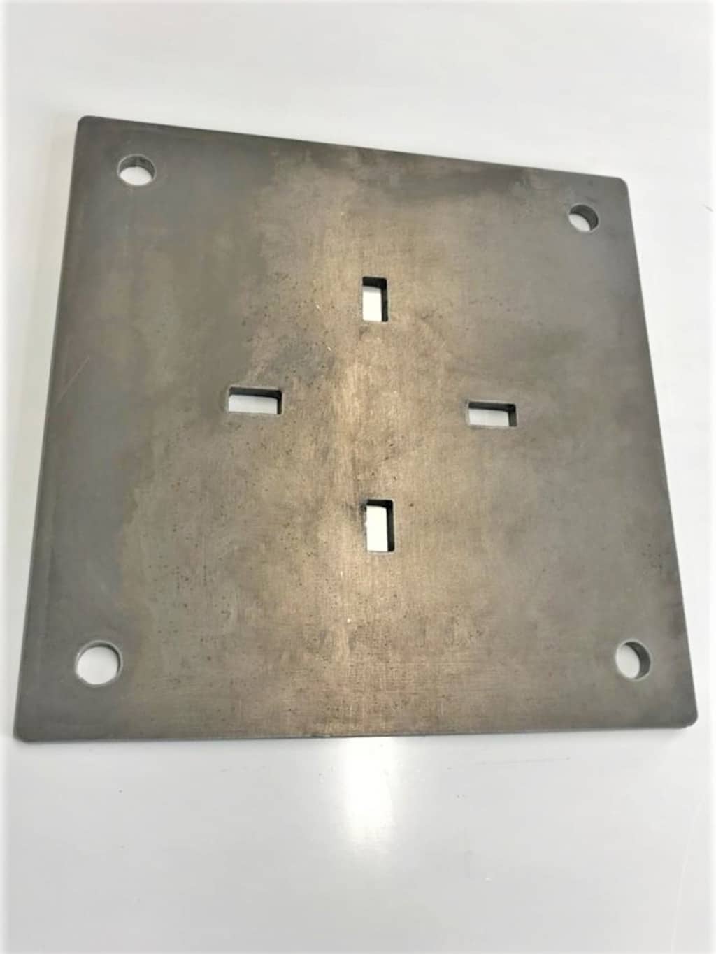 A piece of metal with plasma cutting